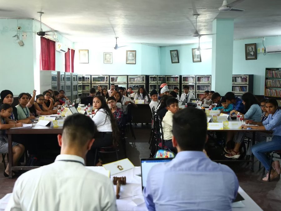 Delegates in committee in the library